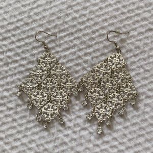 Delicate, detailed silver earrings